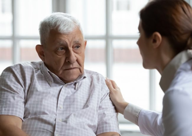 Female,Doctor,Comforting,Upset,Older,Patient Female Doctor Comforting Upset Older Patient