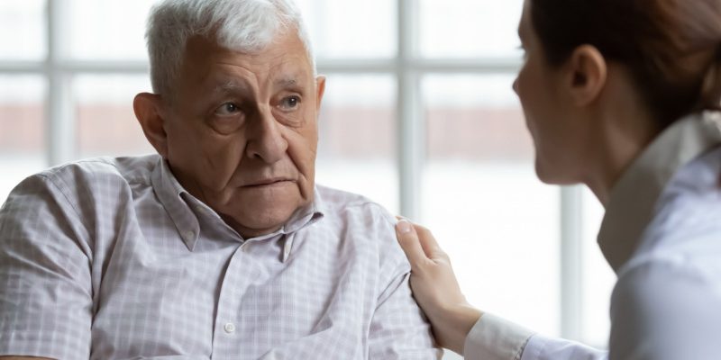 Female,Doctor,Comforting,Upset,Older,Patient Female Doctor Comforting Upset Older Patient