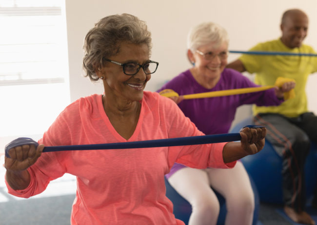 Seniors exercising to help prevent Alzheimer's symptoms