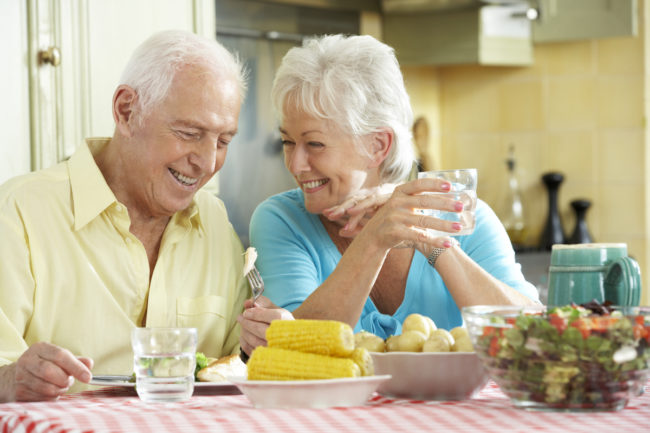 senior-living-for-couples A senior couple living happily in an assisted living facility.