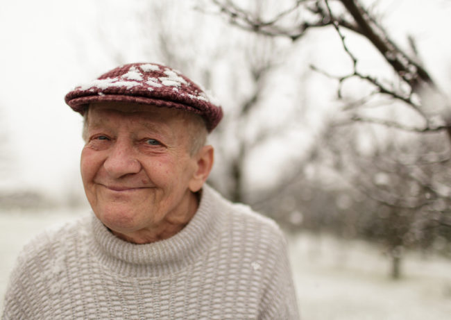 senior-winter-isolation-health A senior enjoying life at an assisted living home during winter.