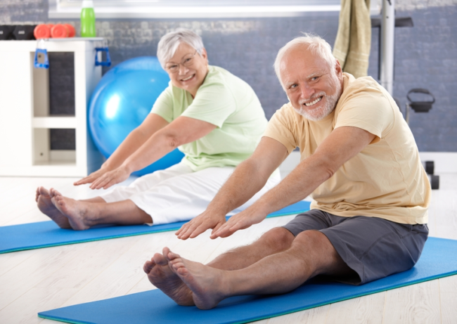 Importance Of Activities For Elderly People  Elderly couple stretching