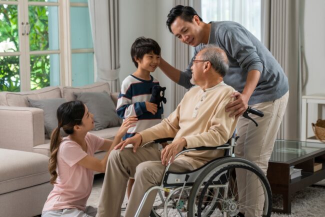 The Role of Family in Skilled Nursing Care: How Families Can Stay Involved and Support Their Loved Ones Young Asian Couple And Child Visiting Grandparents In Nursing Home