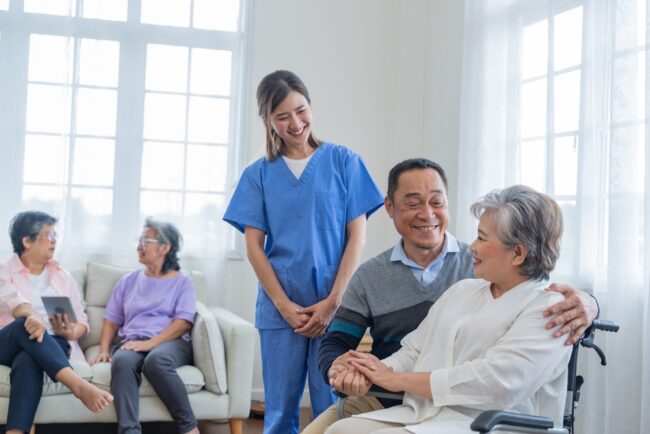 How Assisted Living Communities Support Families and Caregivers Asian,Young,Nurse,Support,Couple,Senior,Older,Man,And,Woman